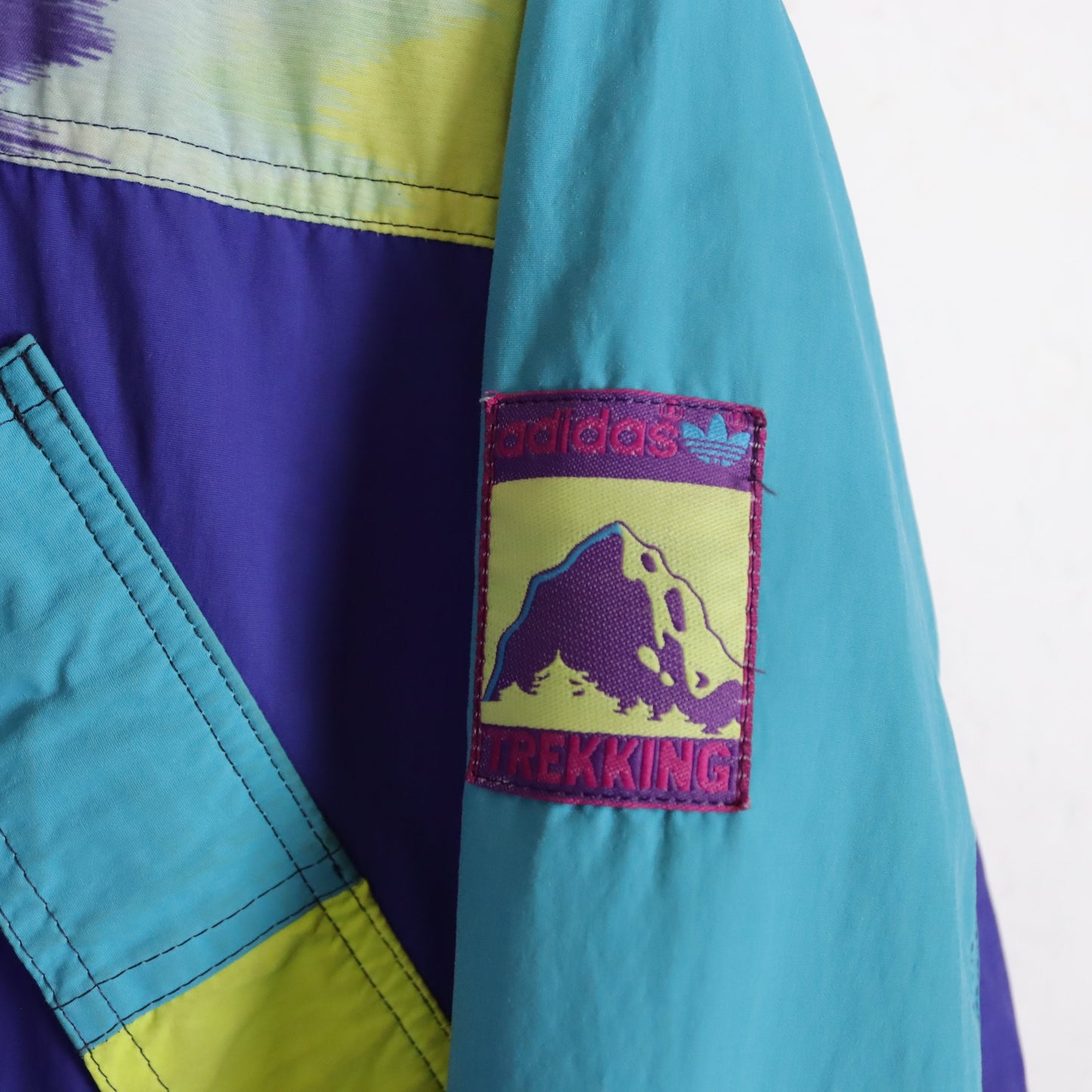 Vintage 80er 90er ADIDAS Trekking Jacke Windbreaker Parka Lila türkis gelb Stehkragen crazy pattern 50 L