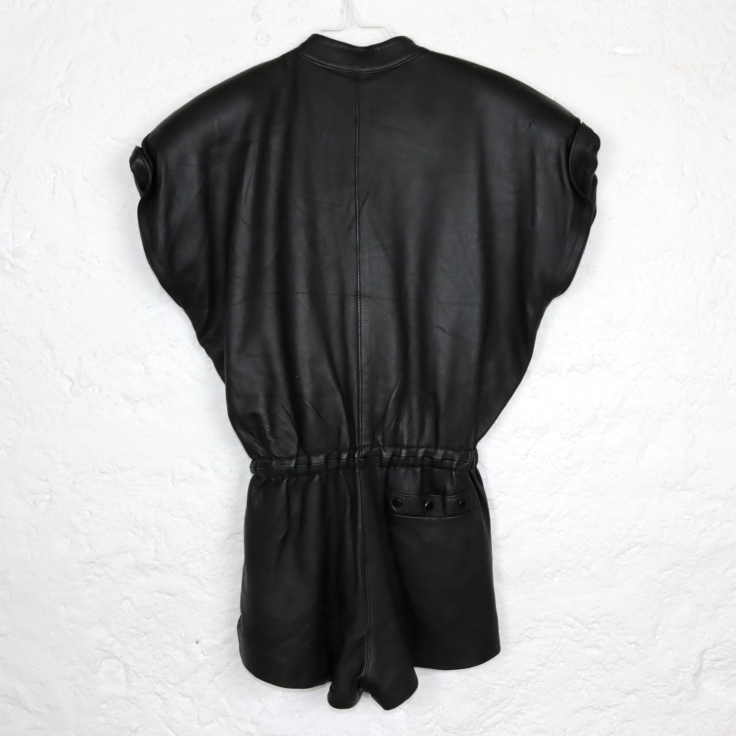Vintage 80s 90s jumpsuit one-piece short sleeve shoulder pads leather black short button placket fitted 36