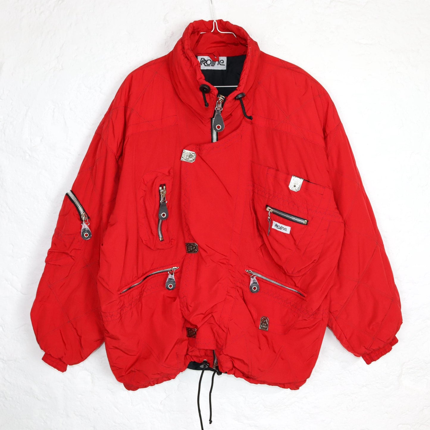 Vintage 80er 90er PROLINE Skijacke Winterjacke gefüttert Stehkragen rot Schulterpolster L