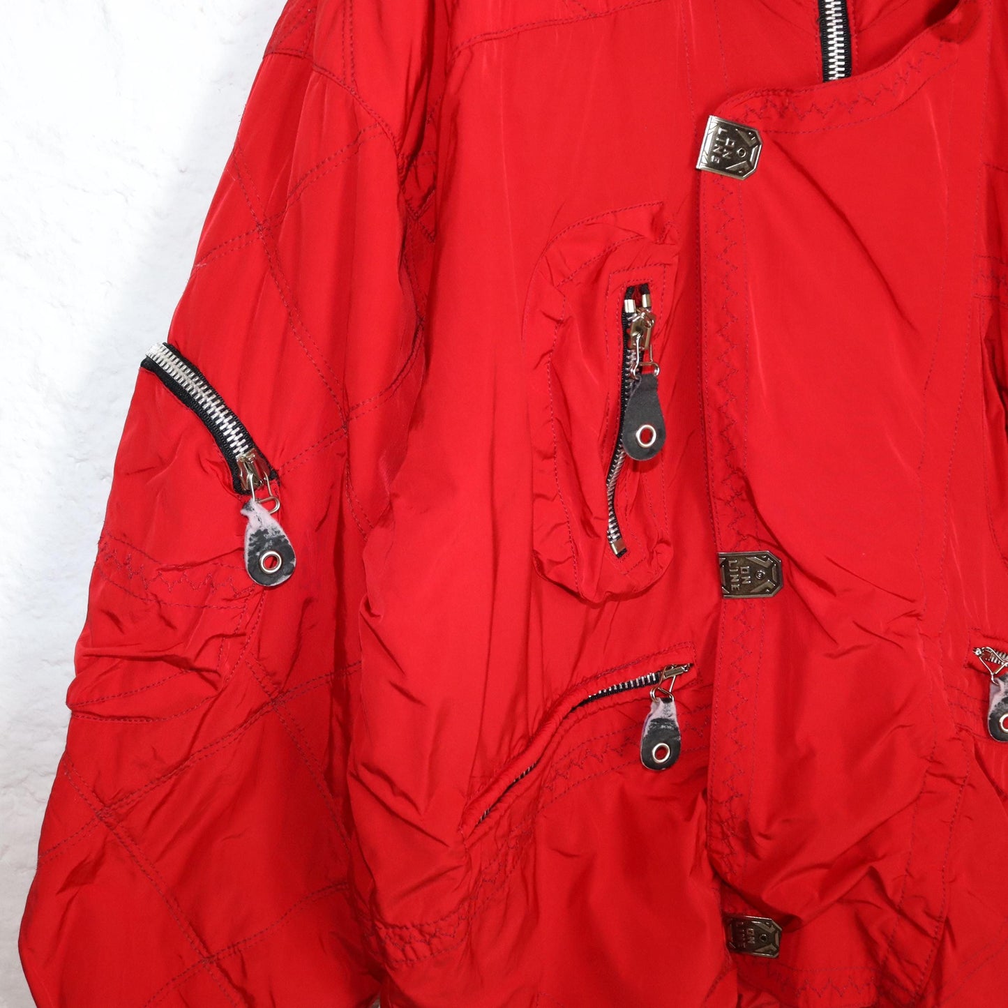 Vintage 80er 90er PROLINE Skijacke Winterjacke gefüttert Stehkragen rot Schulterpolster L