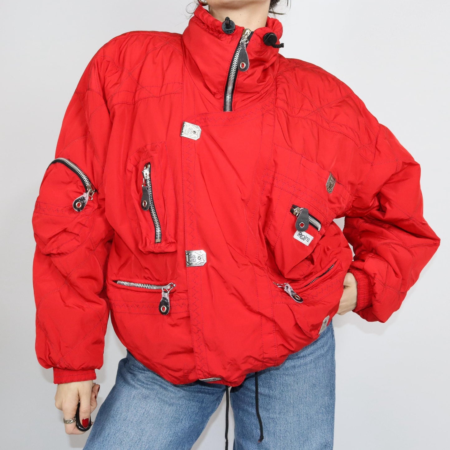 Vintage 80er 90er PROLINE Skijacke Winterjacke gefüttert Stehkragen rot Schulterpolster L