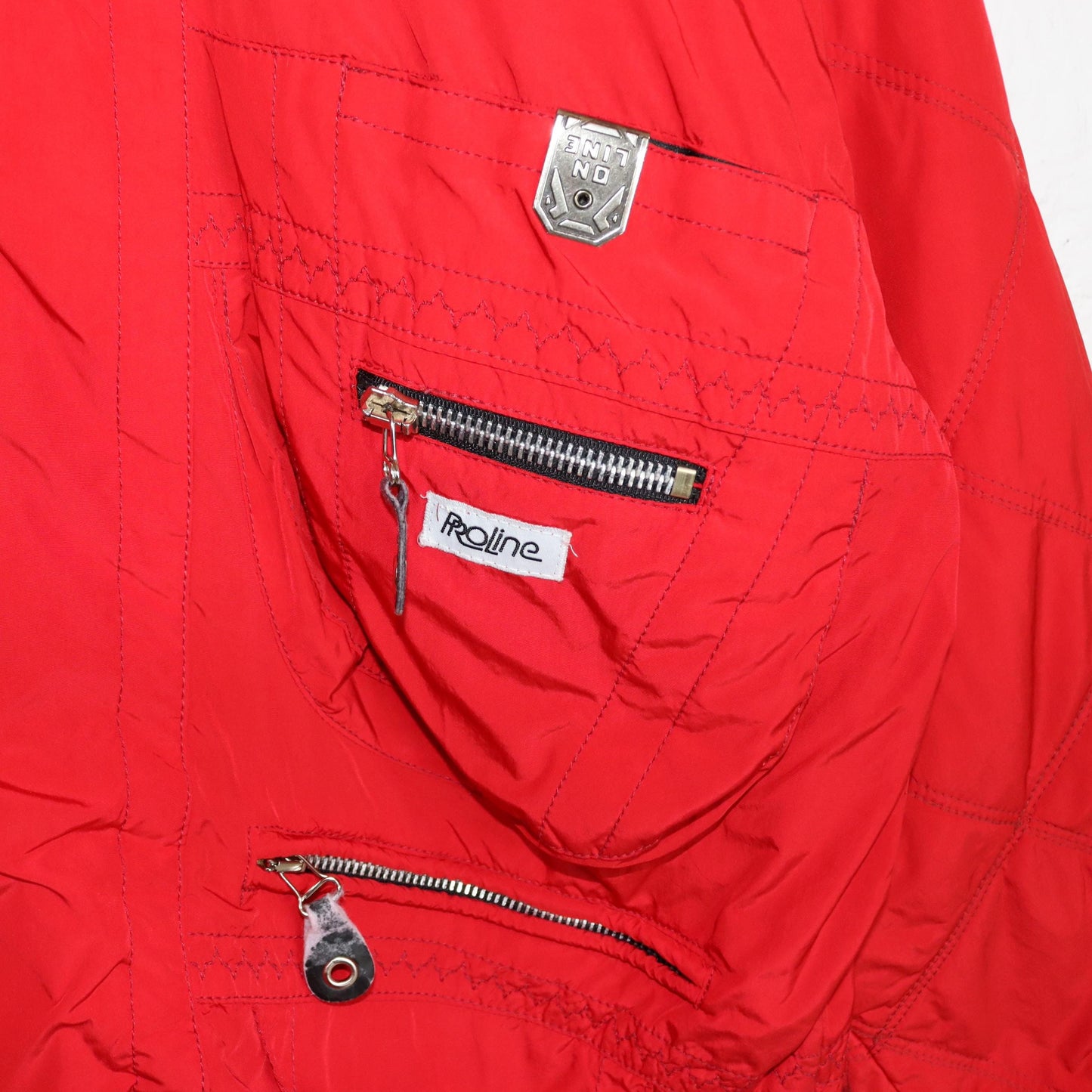 Vintage 80er 90er PROLINE Skijacke Winterjacke gefüttert Stehkragen rot Schulterpolster L