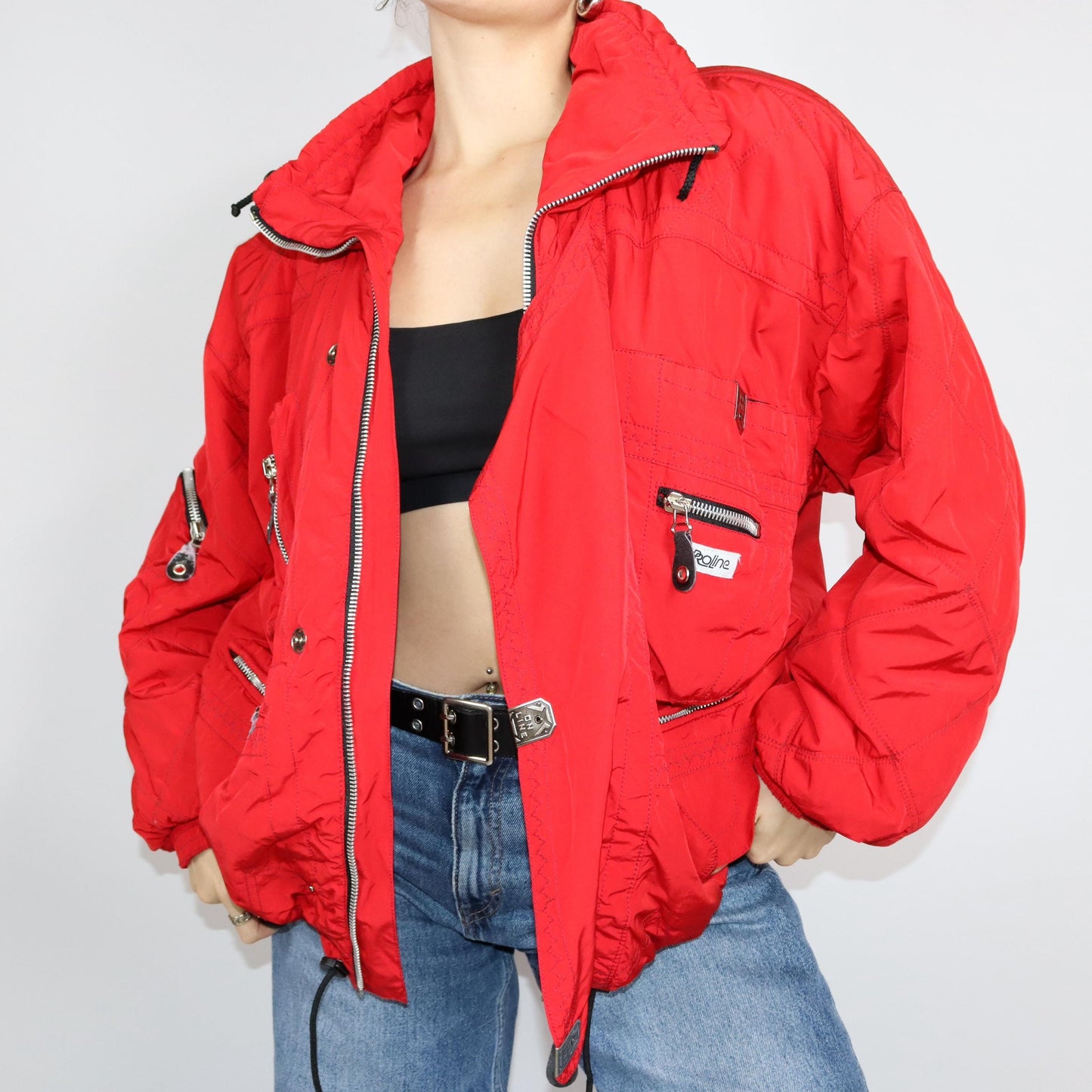Vintage 80er 90er PROLINE Skijacke Winterjacke gefüttert Stehkragen rot Schulterpolster L