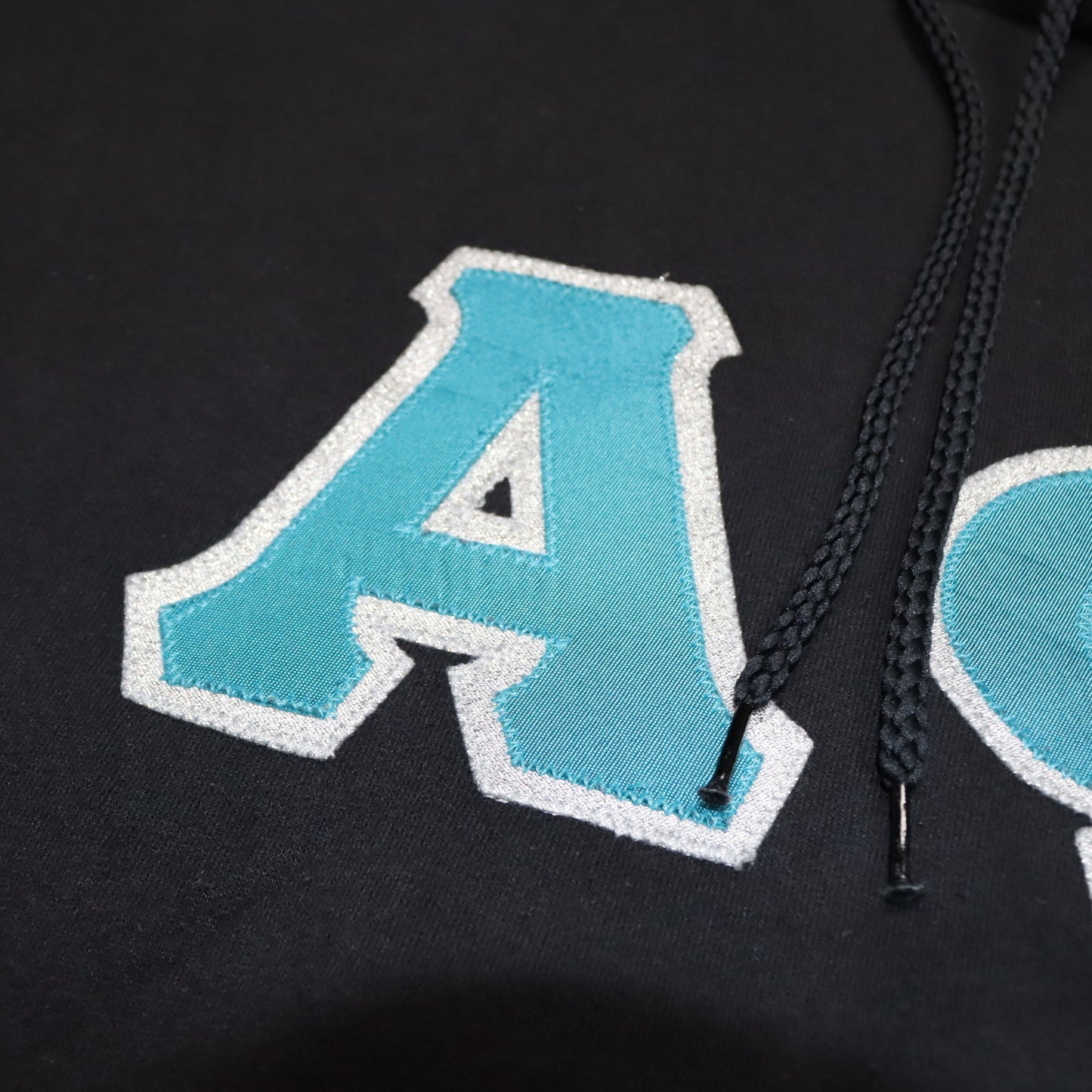 Vintage Hoodie Pullover Aufdruck College türkis schwarz