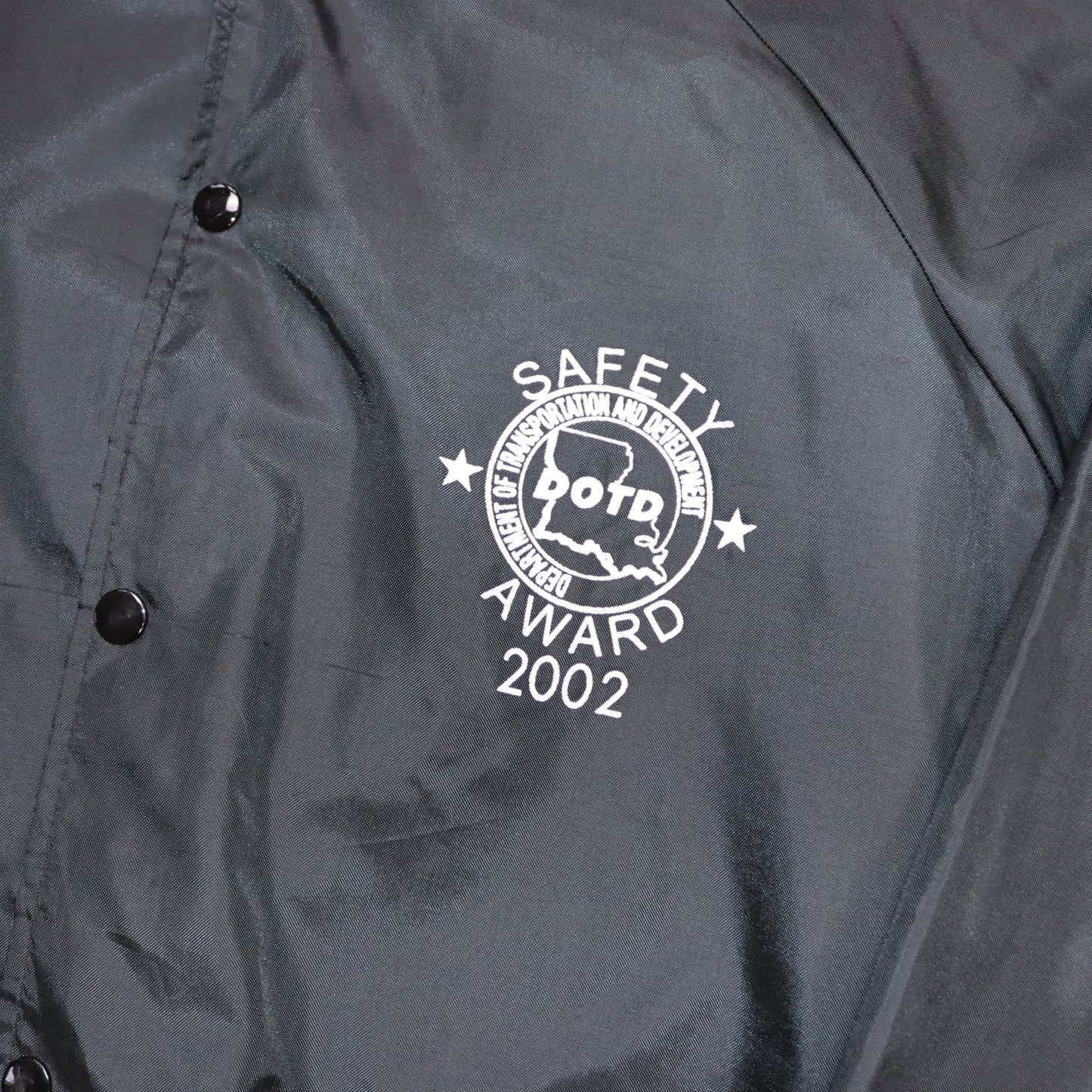 Vintage Y2K Windbreaker Jacke Knopfleiste schwarz Print Vorderseite L