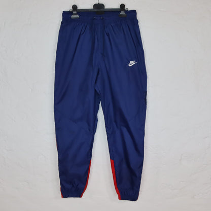 Vintage 90s 00s NIKE tracksuit bottoms dark blue red M