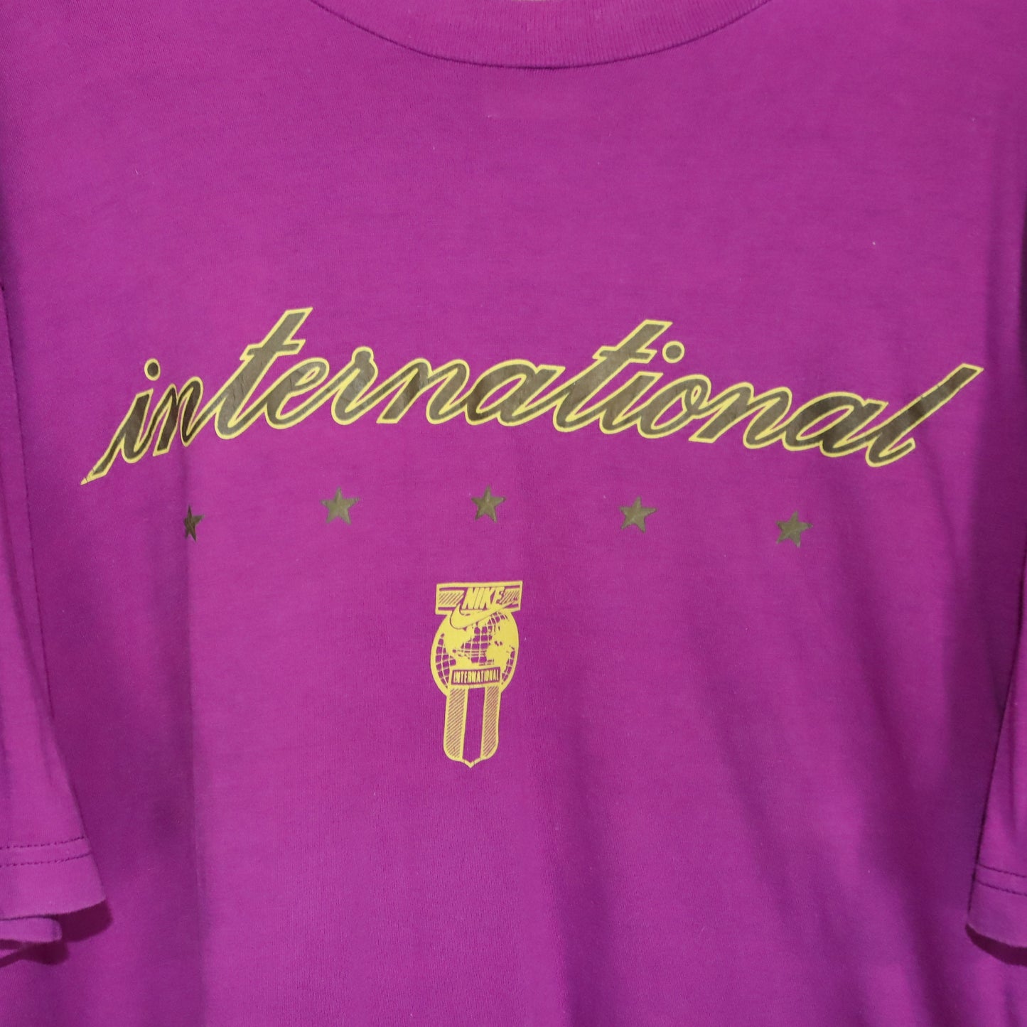Vintage 80s 90s NIKE International T-Shirt short sleeve purple pink with print L