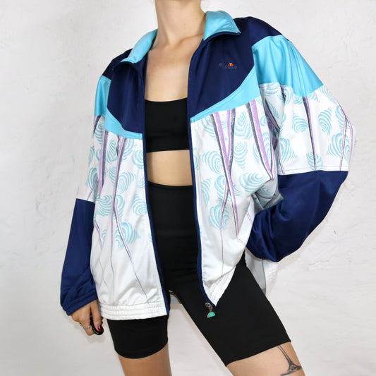 Vintage 80er 90er ELLESSE Trainingsjacke Jacke crazy pattern Stehkragen blau weiß XL