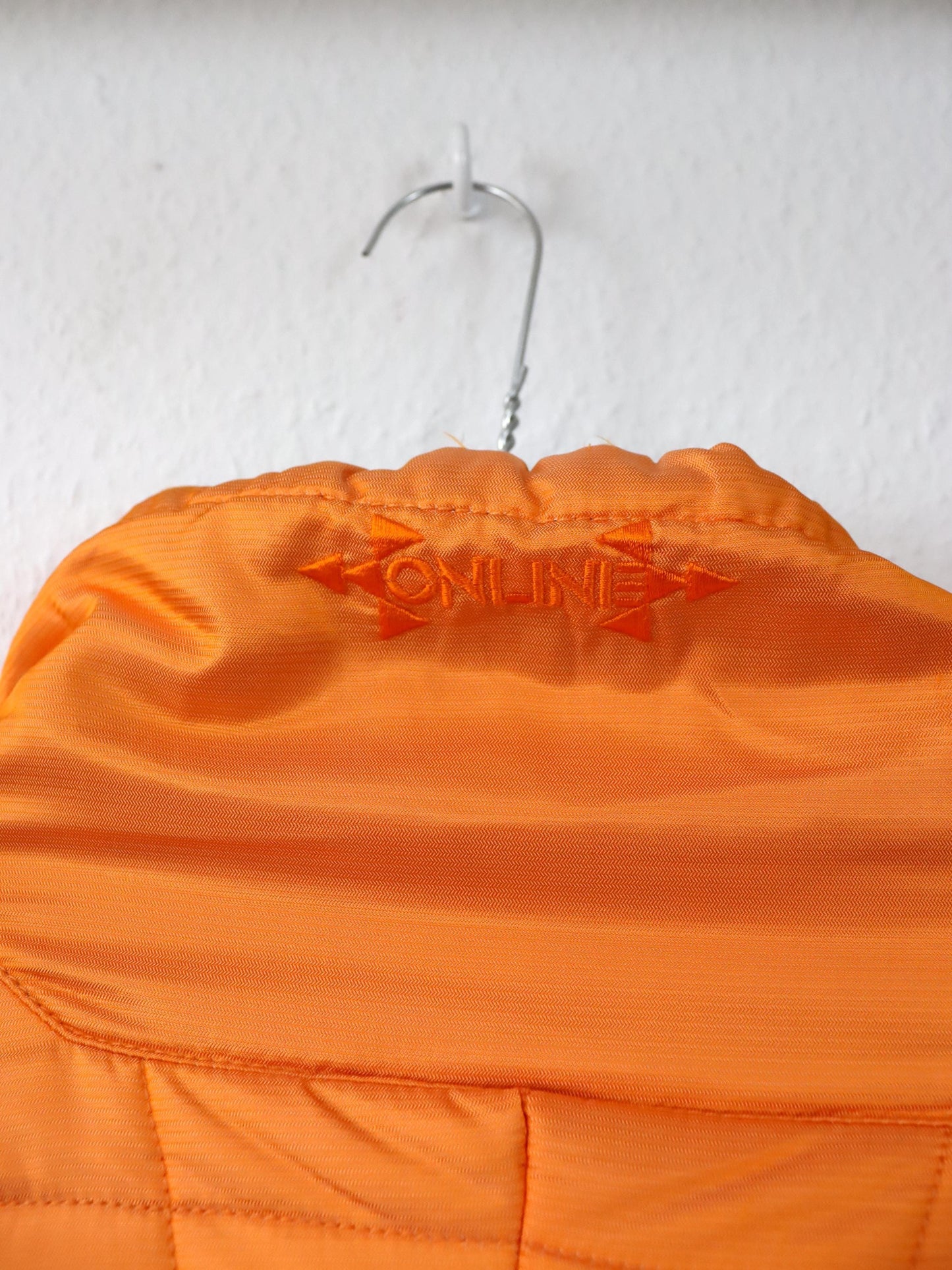 Vintage 80er 90er ONLINE Winterjacke Mantel gefüttert schwarz orange metallic Stehkragen 40 M