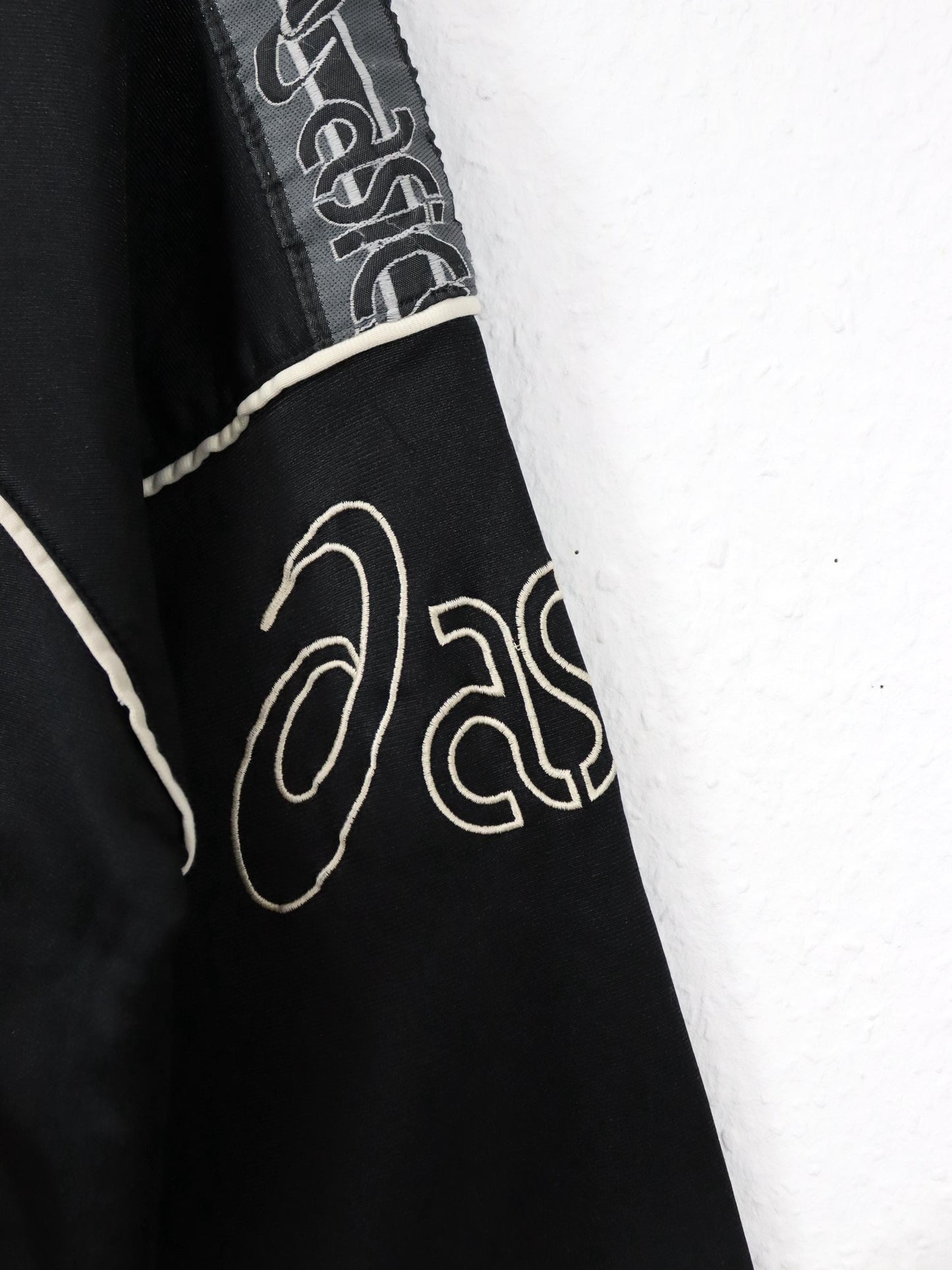 Vintage 80er 90er ASICS Trainingsjacke Stehkragen schwarz weiß S