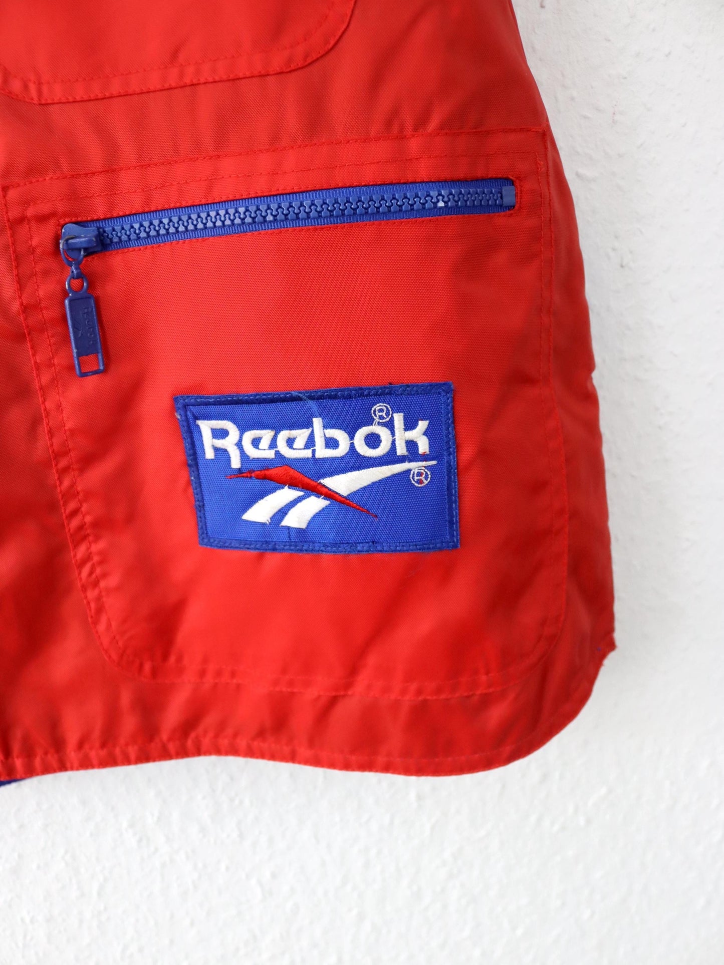 Vintage 80er 90er REEBOK Weste Cargoweste Utility Kapuze blau rot S